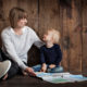 What is Positive Parenting? photo of a young boy in his mother's lap